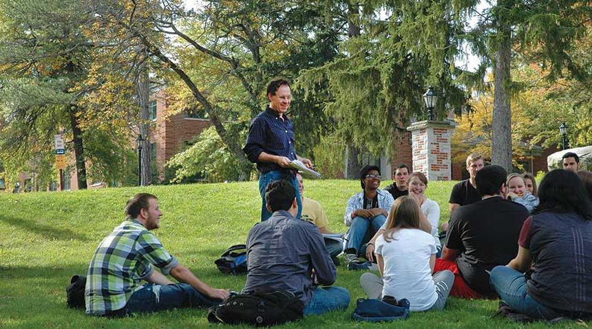 Faculty teaching students outside